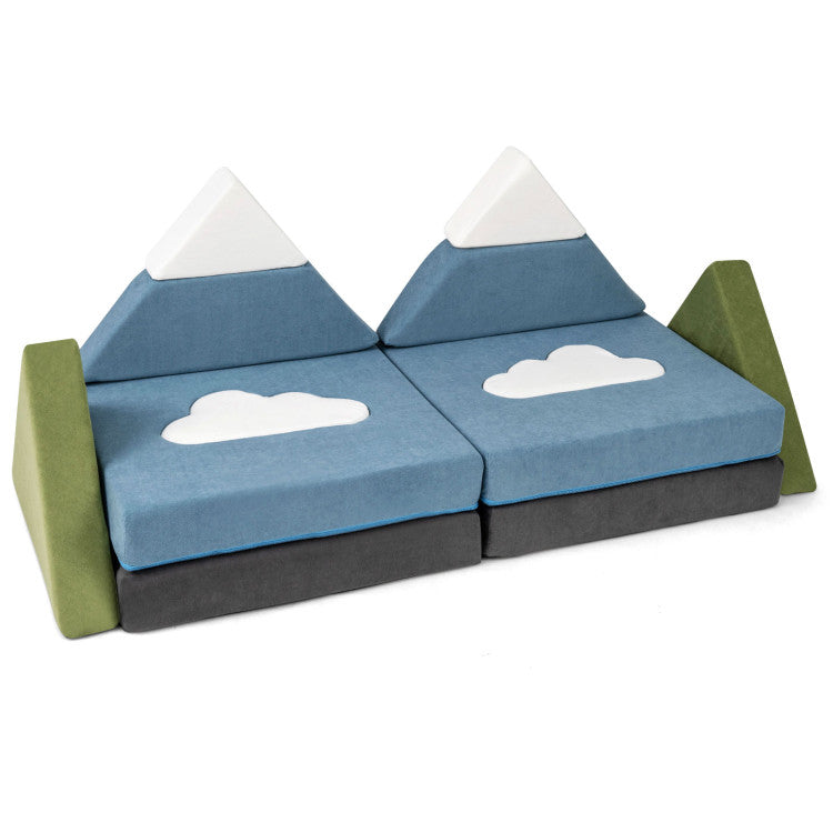 Children's play set with mountain and cloud design on a white background