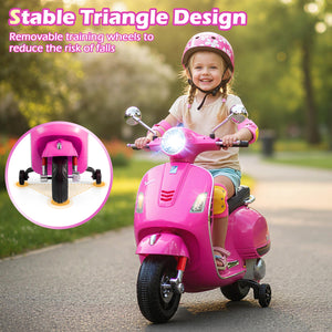 Child riding a pink toy scooter with stable triangle design and removable training wheels, outdoors.