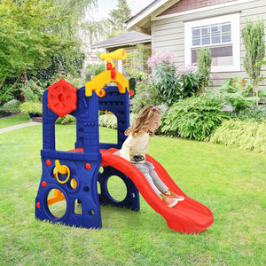 Child playing on a colorful playground slide and climber in a garden.