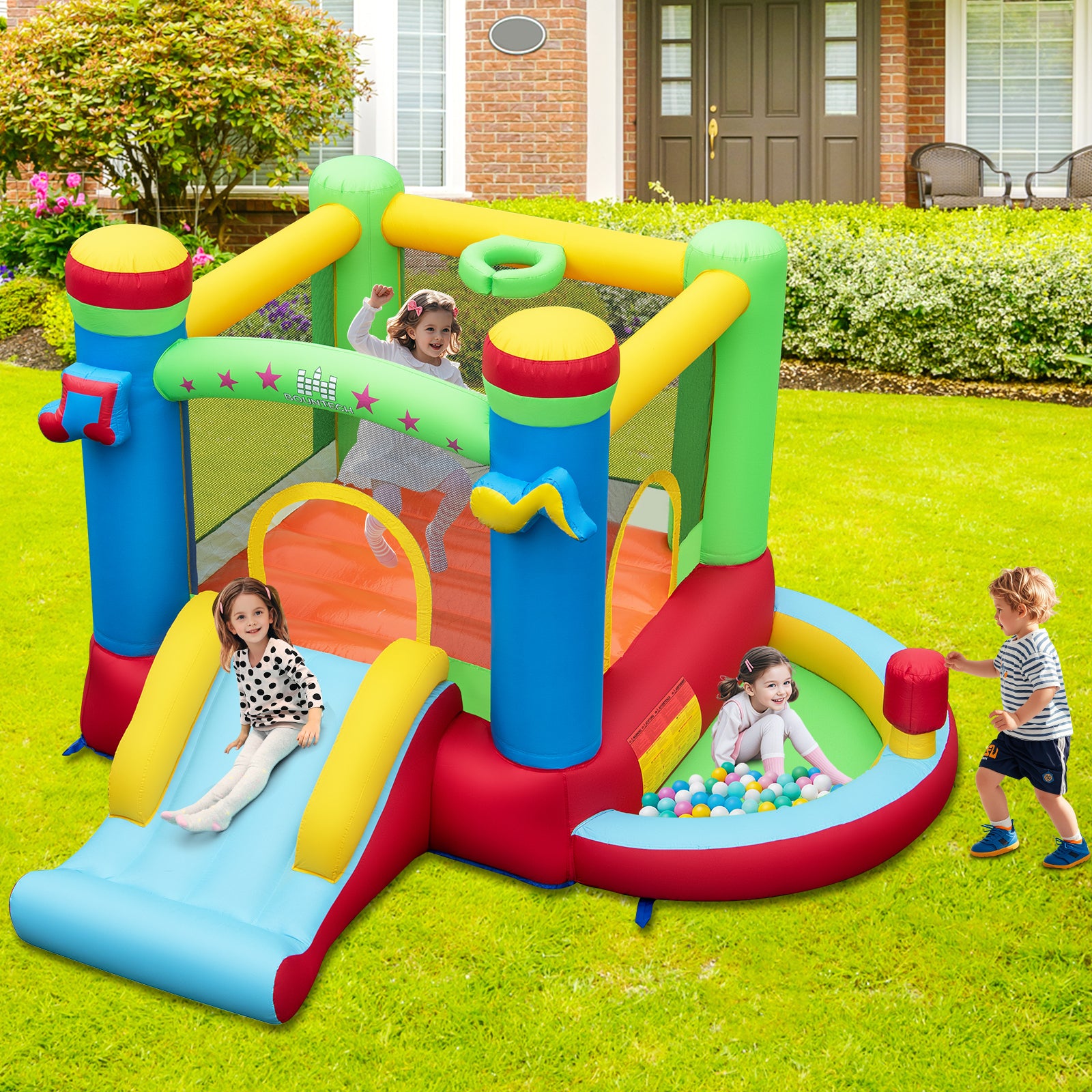 Music-themed inflatable bounce house with slide and ball pit