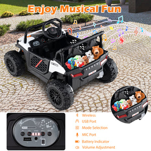 Toy car with teddy bears on a stone surface, featuring musical notes and control panel details.