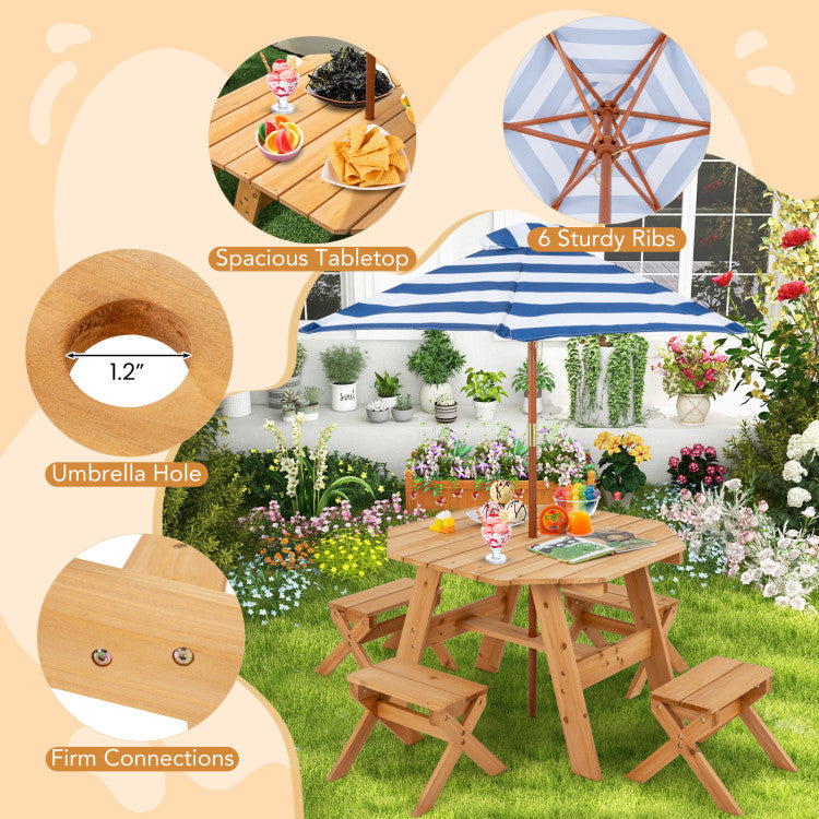 Wooden picnic table with benchs, umbrella, and garden setting