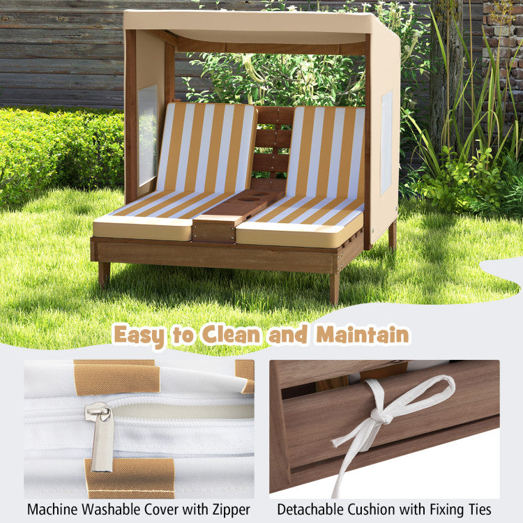 Wooden outdoor bench with striped cushions in a garden setting, featuring machine washable cover and detachable cushion details.