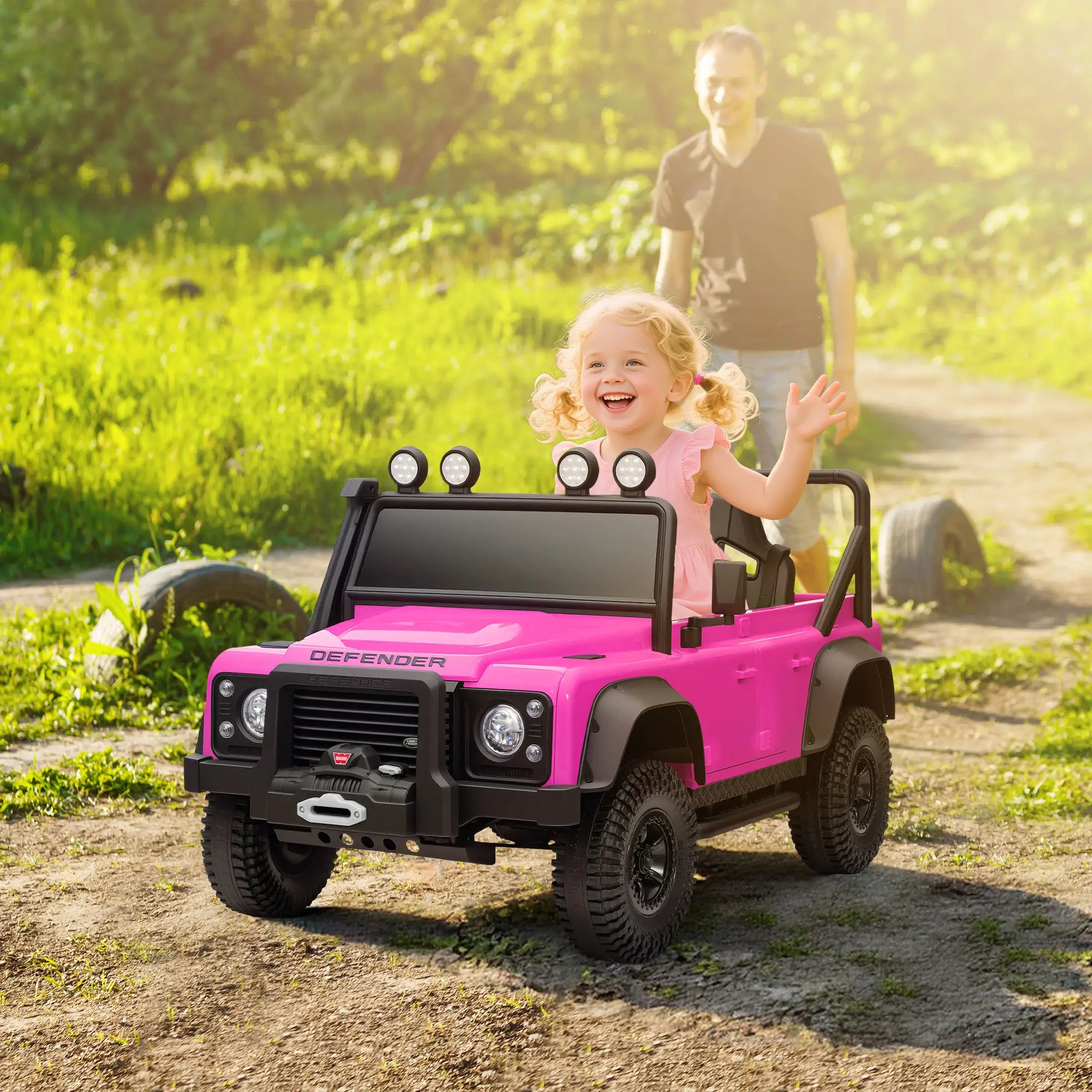 Outdoor kids SUV toy driving on brick or cement path
