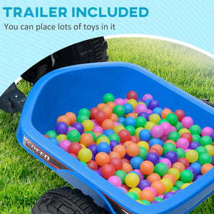 Blue wheelbarrow filled with colorful balls on grass, with text indicating a trailer included.