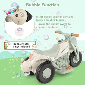 Toy motorcycle with bubble function feature on a green background