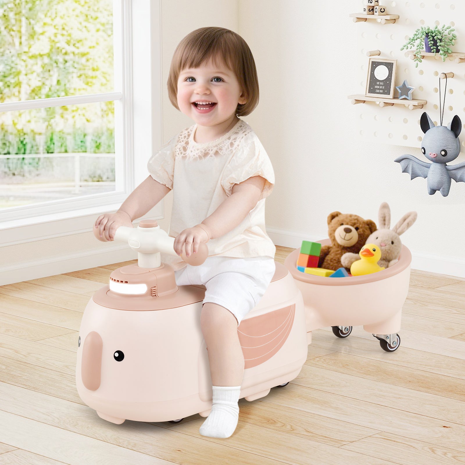 Child playing with a pink toy car in a room with toys and decorations.