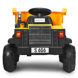 Toy dump truck with black and yellow colors on a white background