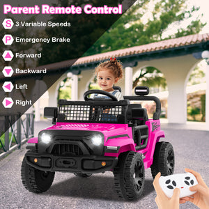 Child in a pink toy car with remote control, outdoor setting