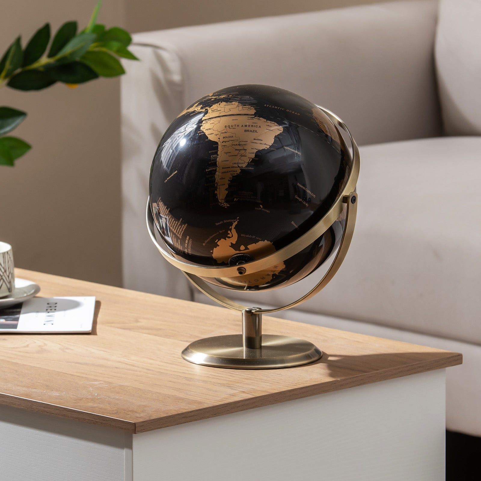 Rotating world globe with durable metal stand and detailed political map