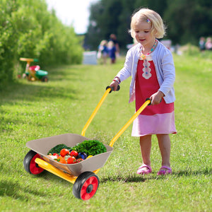 Kids toy cart used near sandbox in garden