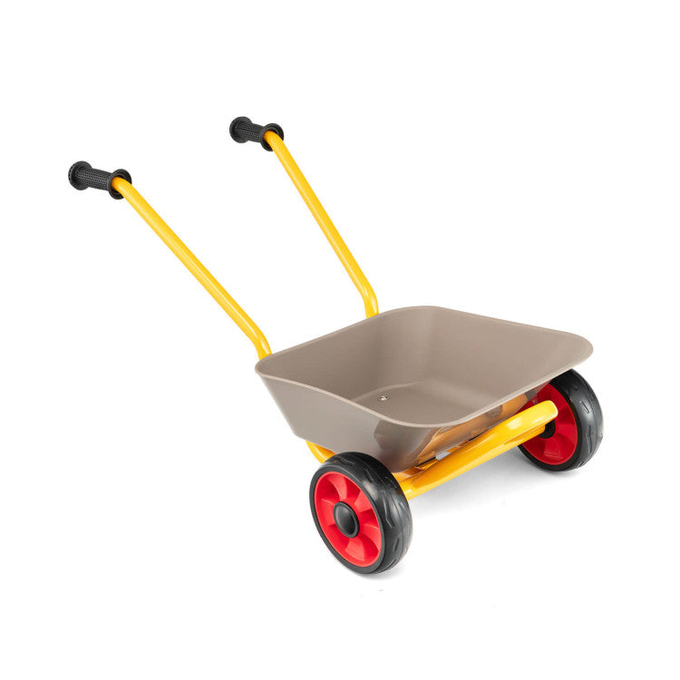Toddler 2‑wheel cart at sandbox play hub