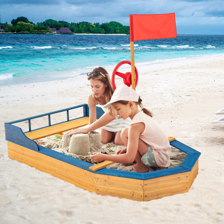 Sandbox with rake and sand tools for kids