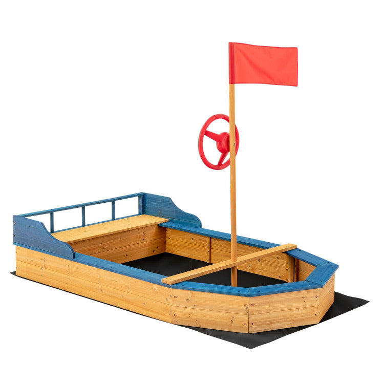 Sandbox with shovel and storage bench