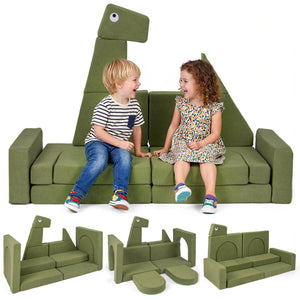 Children sitting on a green dinosaur-shaped sofa with additional pieces displayed below.