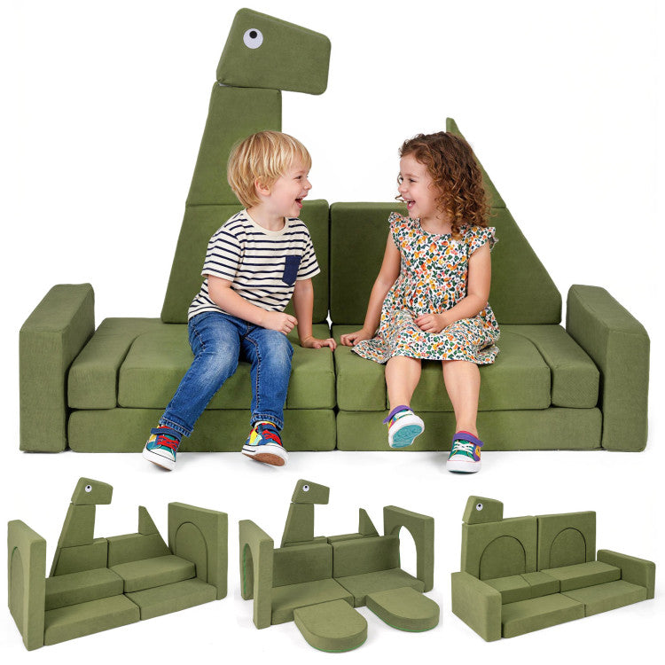 Children sitting on a green dinosaur-shaped sofa with additional pieces displayed below.