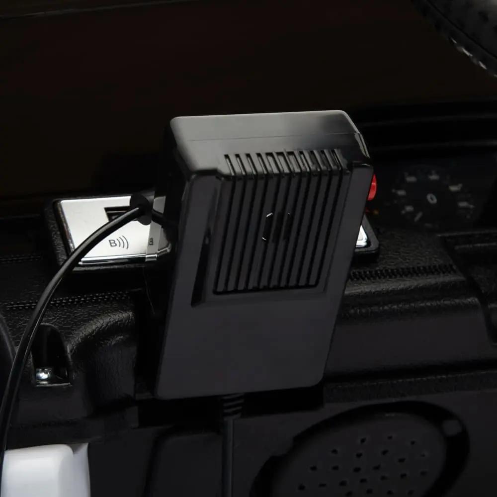 Child riding TOBBI 6V Electric Police Car during playtime