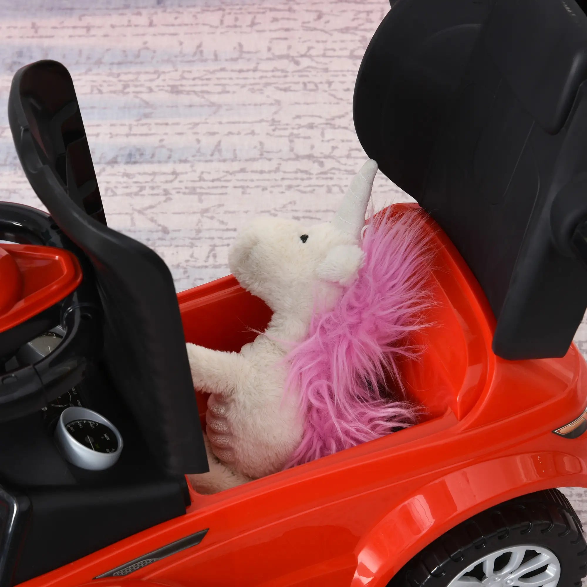 Ride on toy with built in music function