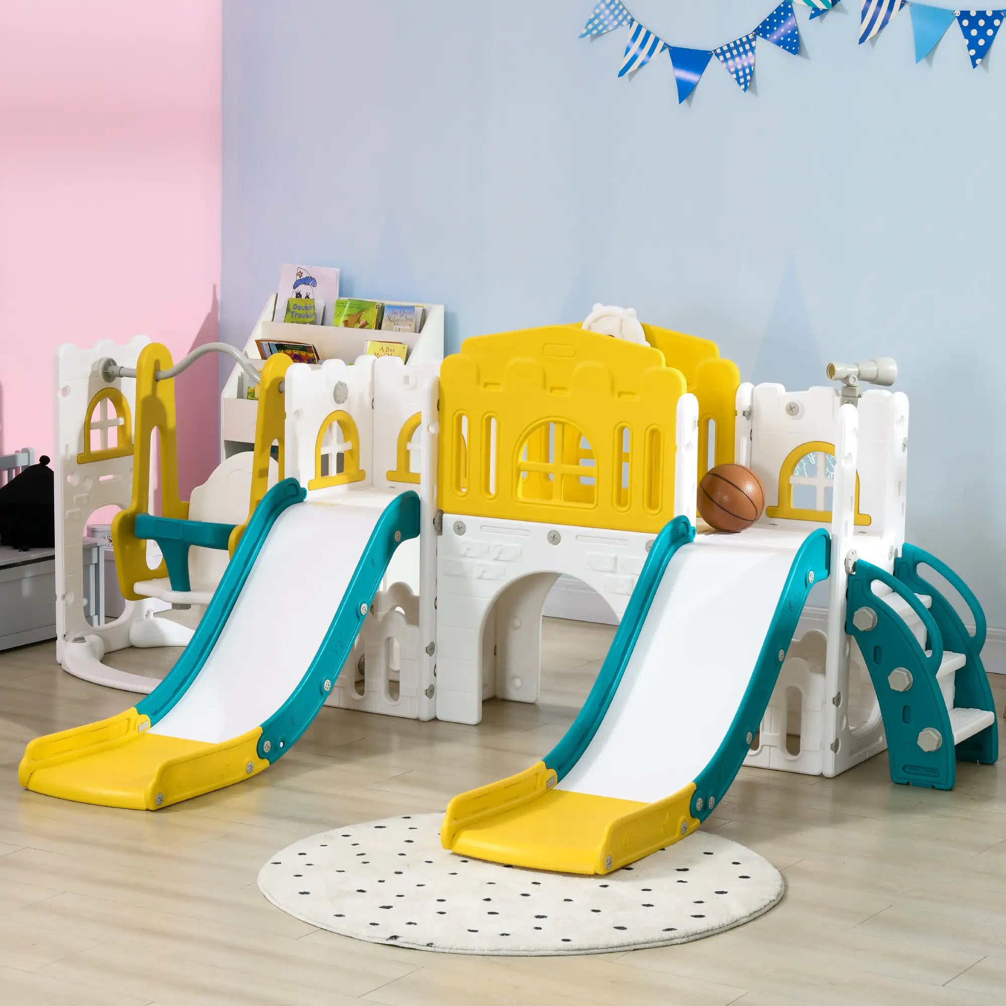 Children's playset with slides and climbing structure in a room.