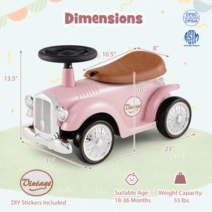 Pink vintage-style toy car with dimensions and safety certification logos on a light green background.