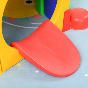 Colorful children's play structure with a red slide on a blue floor.