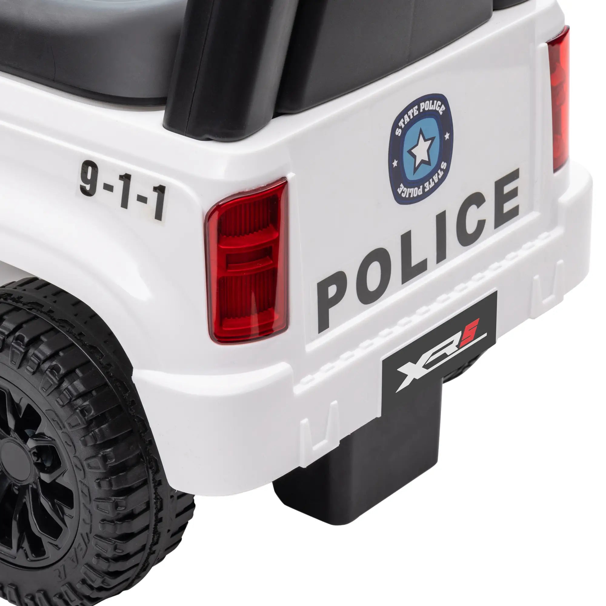 Back view of a toy police car with 'POLICE' and '9-1-1' text.