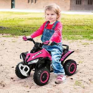 Child sitting on a pink and black toy ATV in an outdoor setting