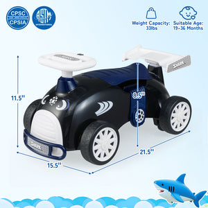 Toy car with shark design and measurements on a light blue background