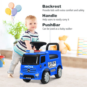 Child playing with a blue police toy car in a room with balloons and toys.