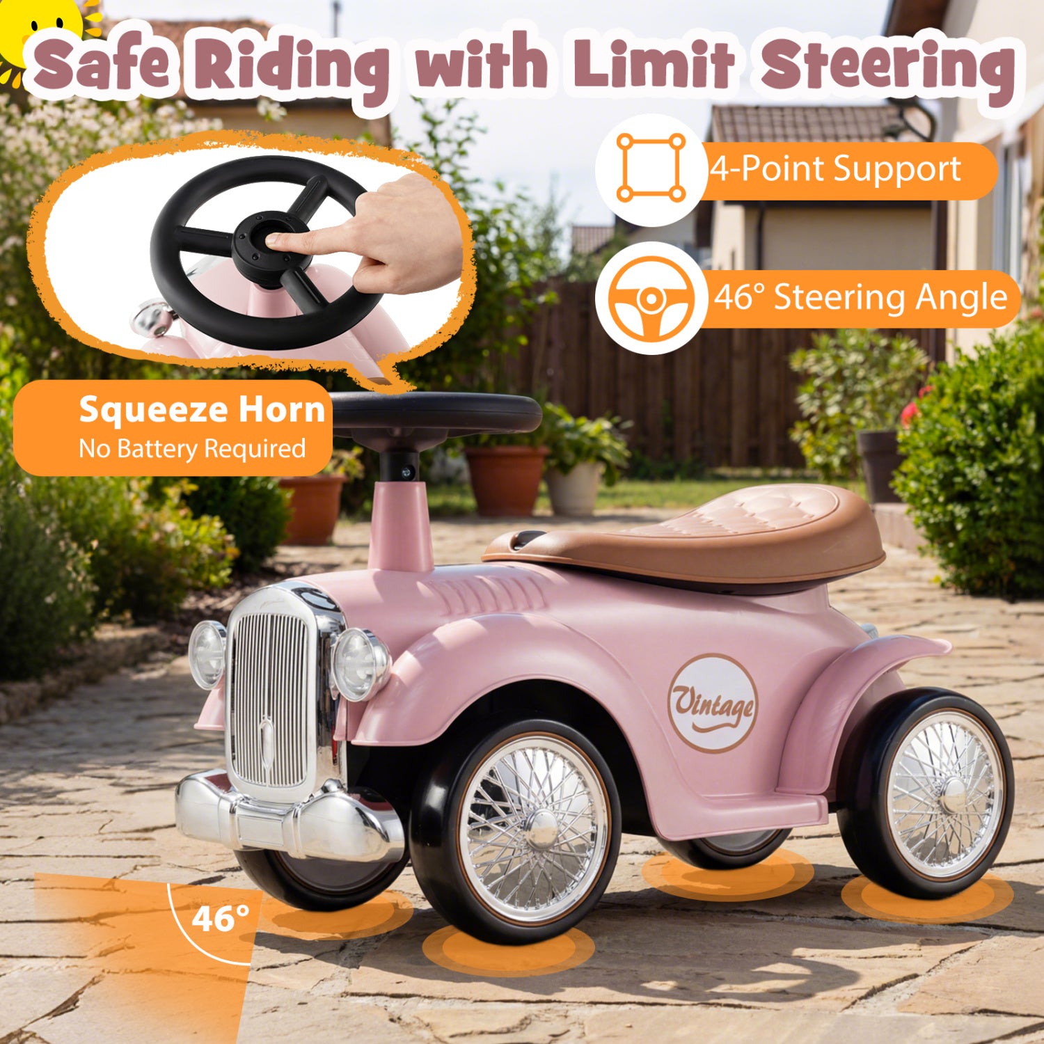 Pink toy car with steering wheel and horn on a patio