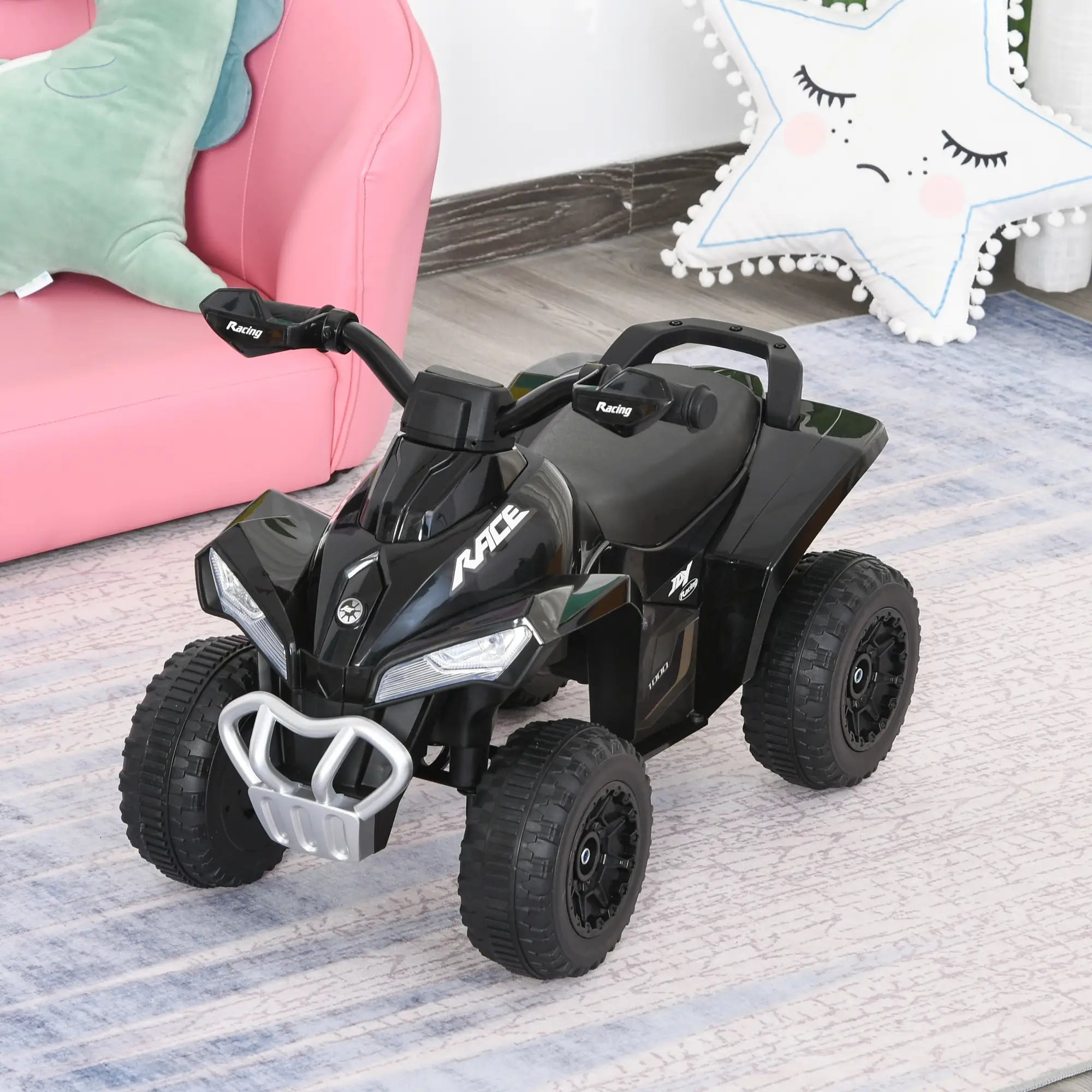 Black toy ATV on a carpeted floor with a pink couch and decorative items in the background
