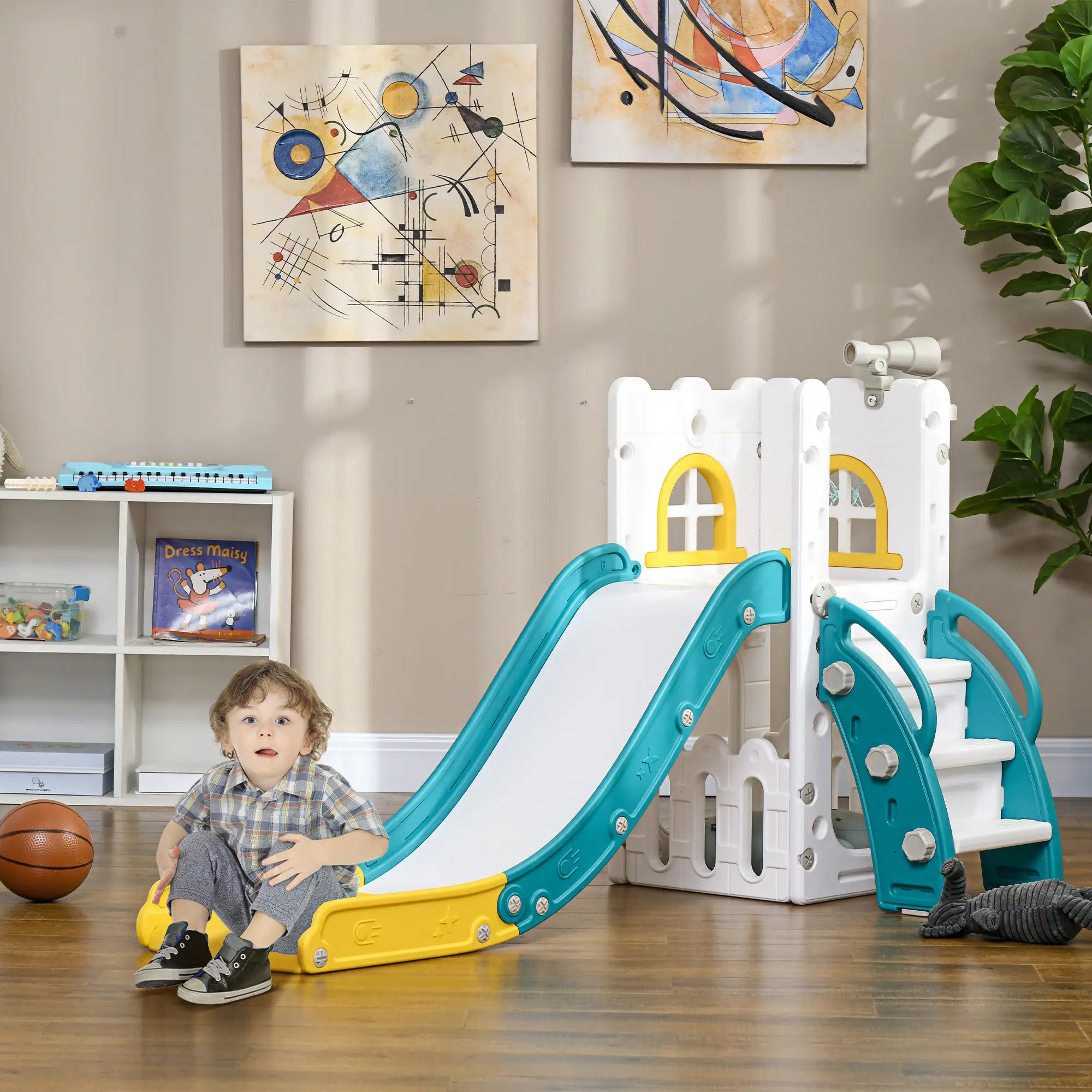 Child playing with a colorful plastic slide in a room with a bookshelf and wall art.