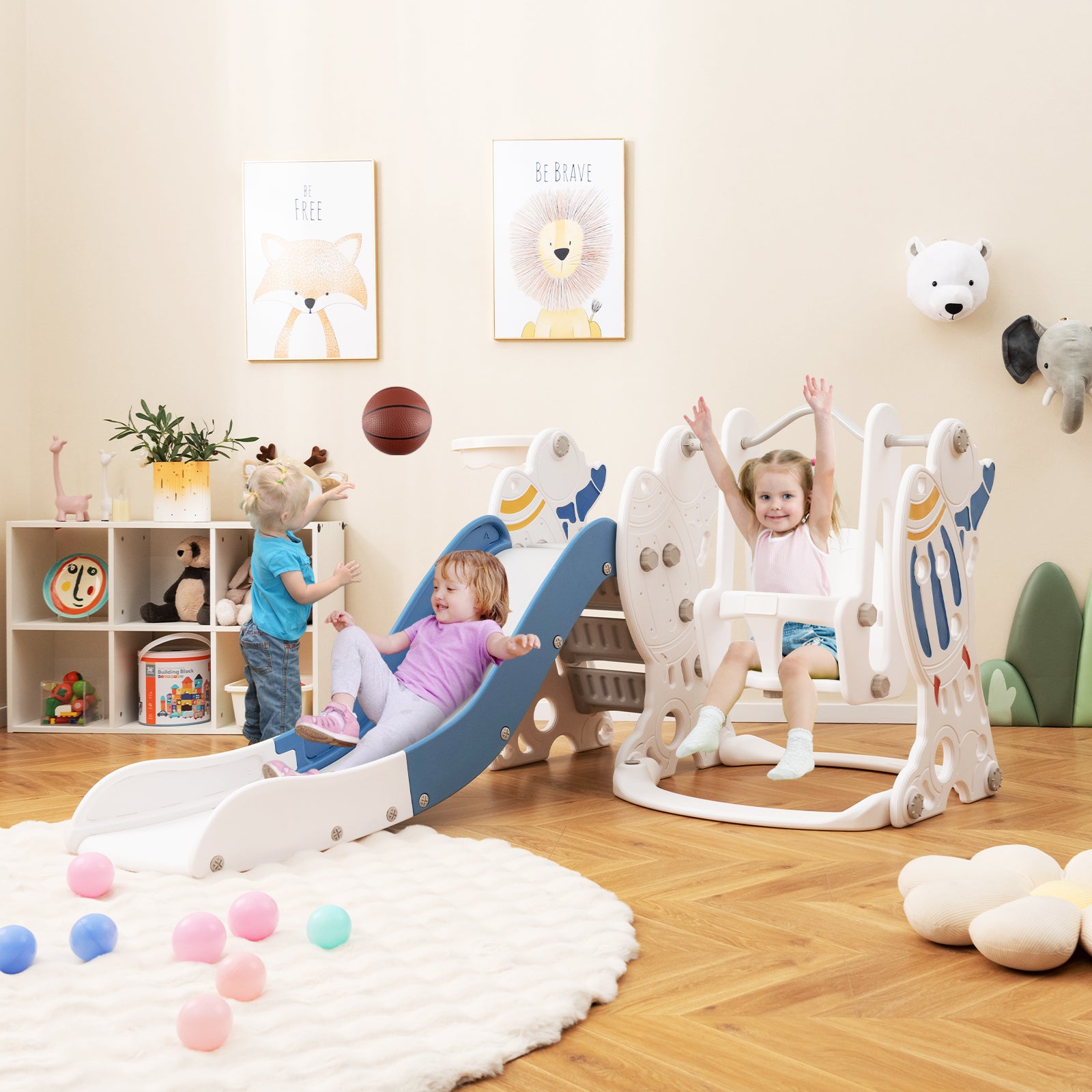 Children playing in a room with toys and furniture