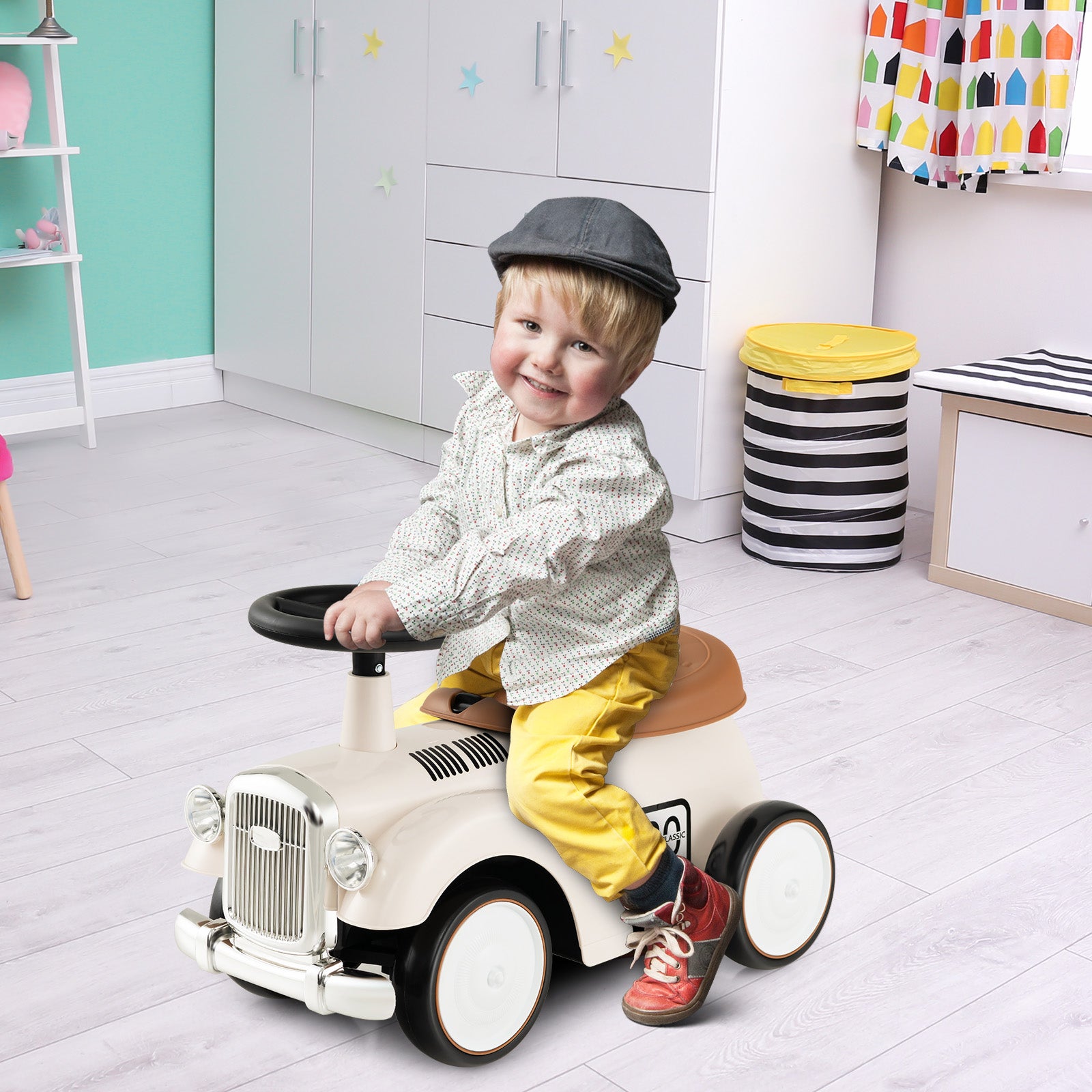 Child sitting on a toy car in a room with colorful walls and toys.