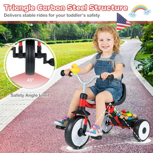 Child riding a tricycle with safety features highlighted, outdoors on a path.