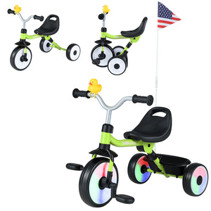Children's tricycle with colorful wheels and a flag on a white background