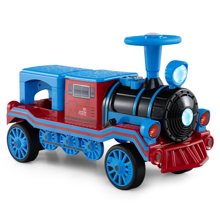 Child riding a 12V train whistle ride on toy outdoors