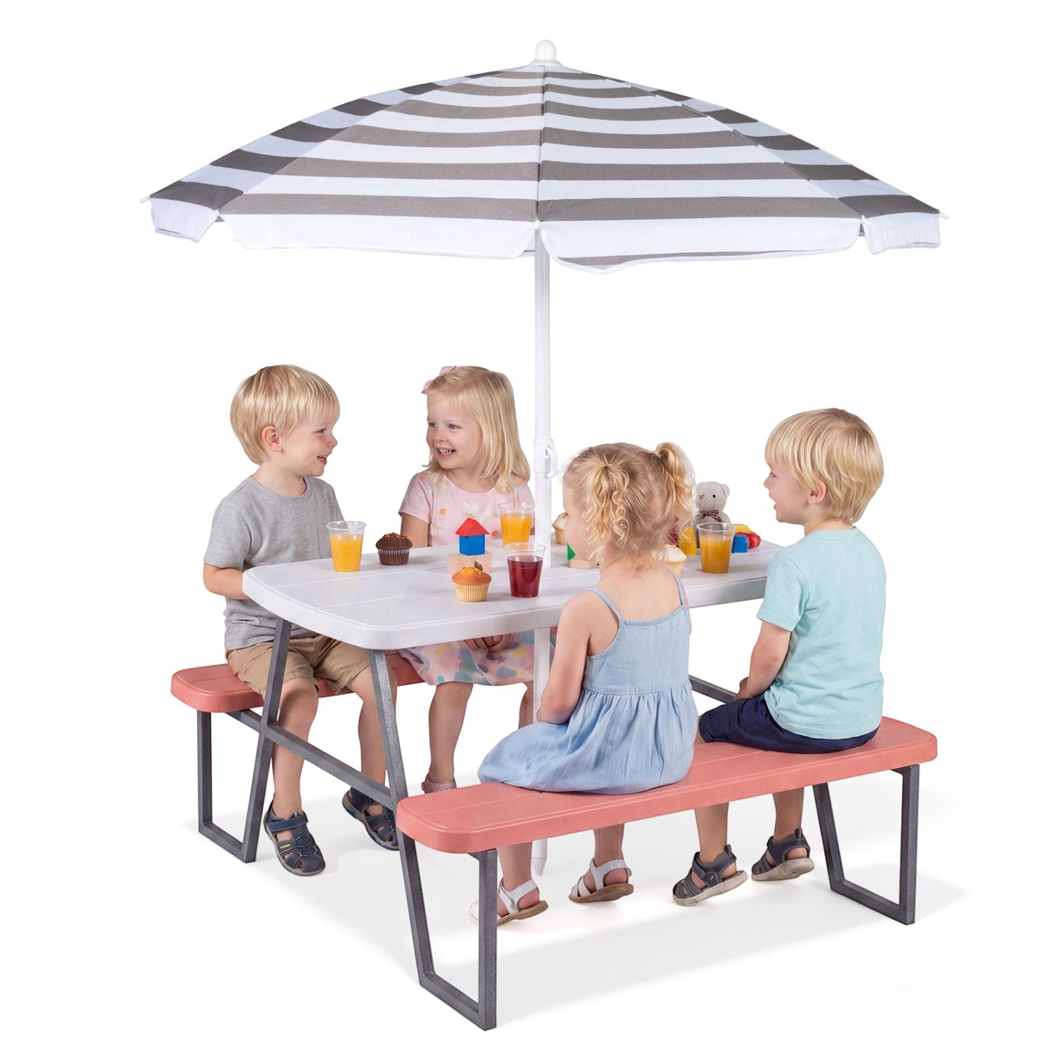 Children sitting at a table with a striped umbrella on a white background