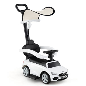 White toy car with black accents on a white background