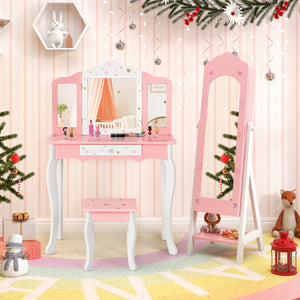Pink vanity table with mirror and standing mirror in a decorated room.