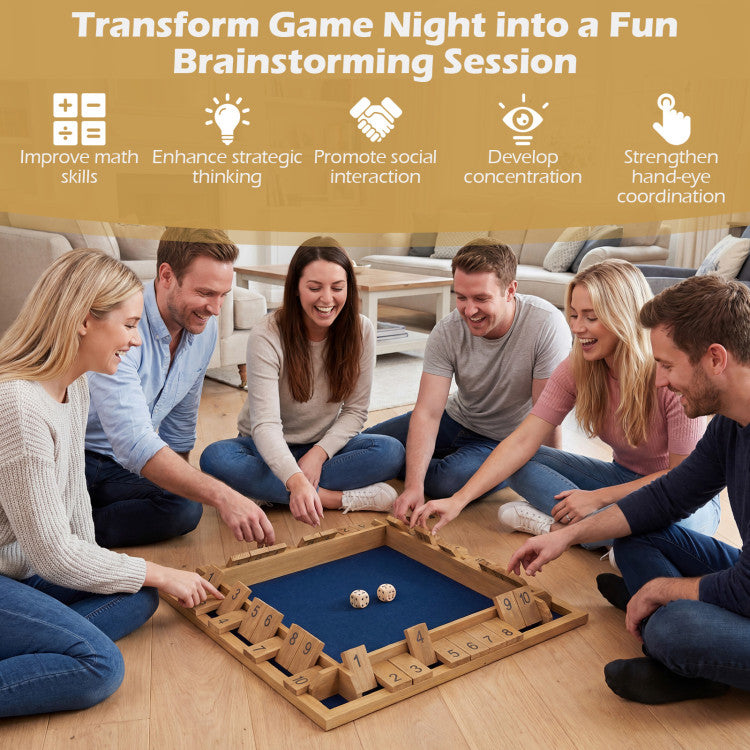 Group of people playing a board game together in a living room.
