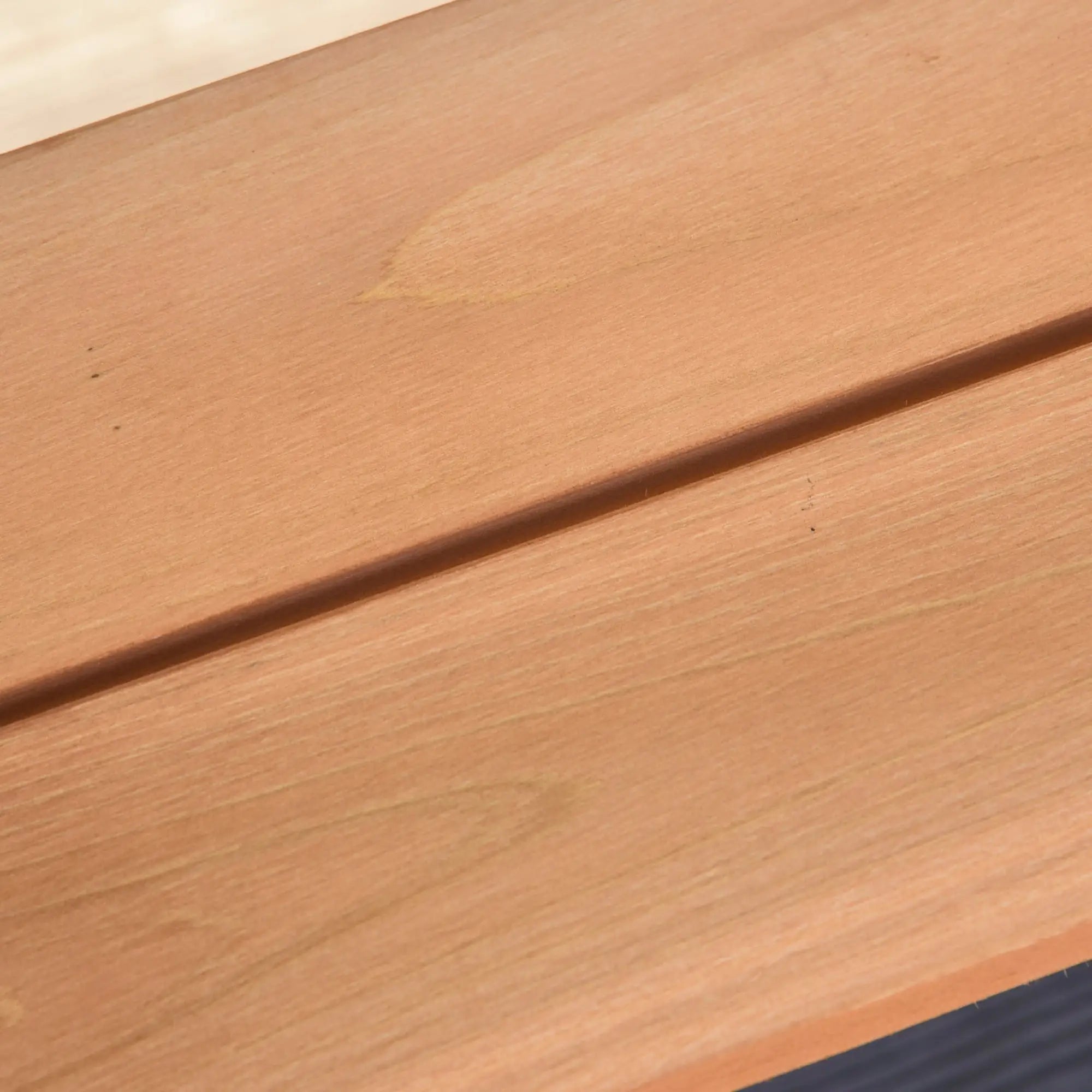 Close-up of a wooden surface with a visible grain pattern