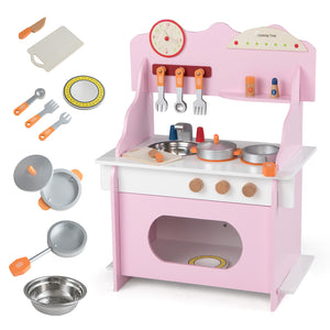 Pink toy kitchen set with various accessories on a white background