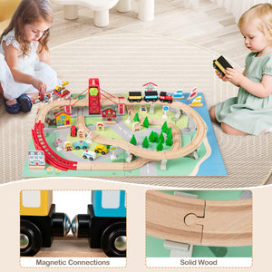 Wooden railway playset with bridges, buildings, and vehicles