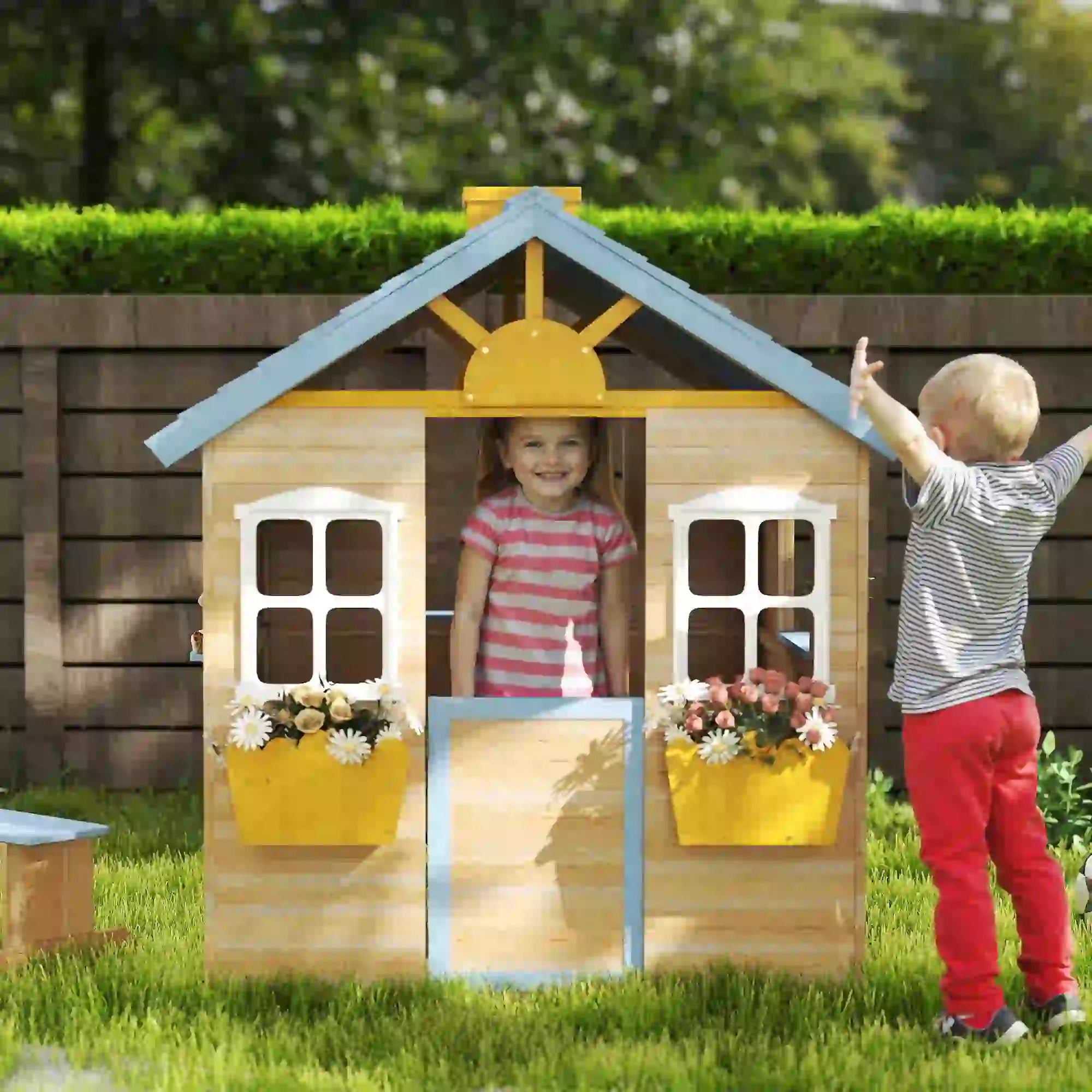 Wooden playhouse with bench and flower pot holder